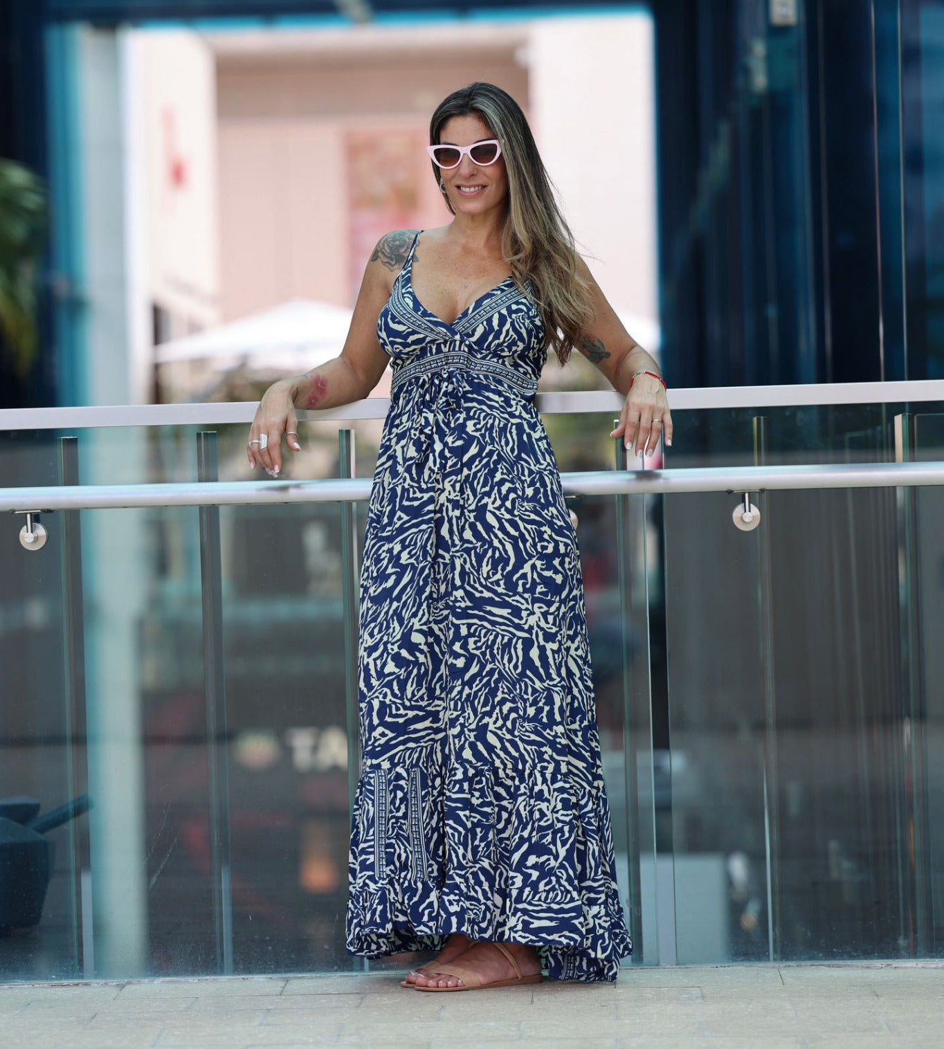 woman wearing Donna Dress , long blue ans white  printed maxi dress in silk blend, elegant summer style.