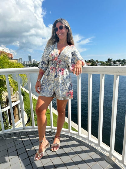 Front view of model wearing Fernanda multicolor silk-blend short romper with short sleeves, casual summer outfit