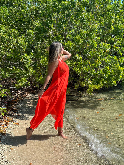 Woman wearing Scarlet Dress, long red maxi dress, summer resort outfit