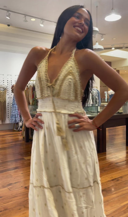 Model wearing a white knit long dress with crochet top, summer elegant style-perfect for beachwear or evening looks