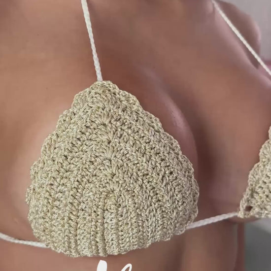 short video showing cream crochet bikini top details