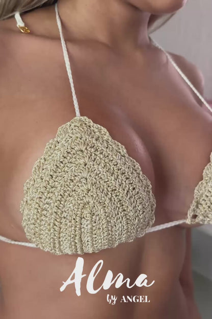 short video showing cream crochet bikini top details